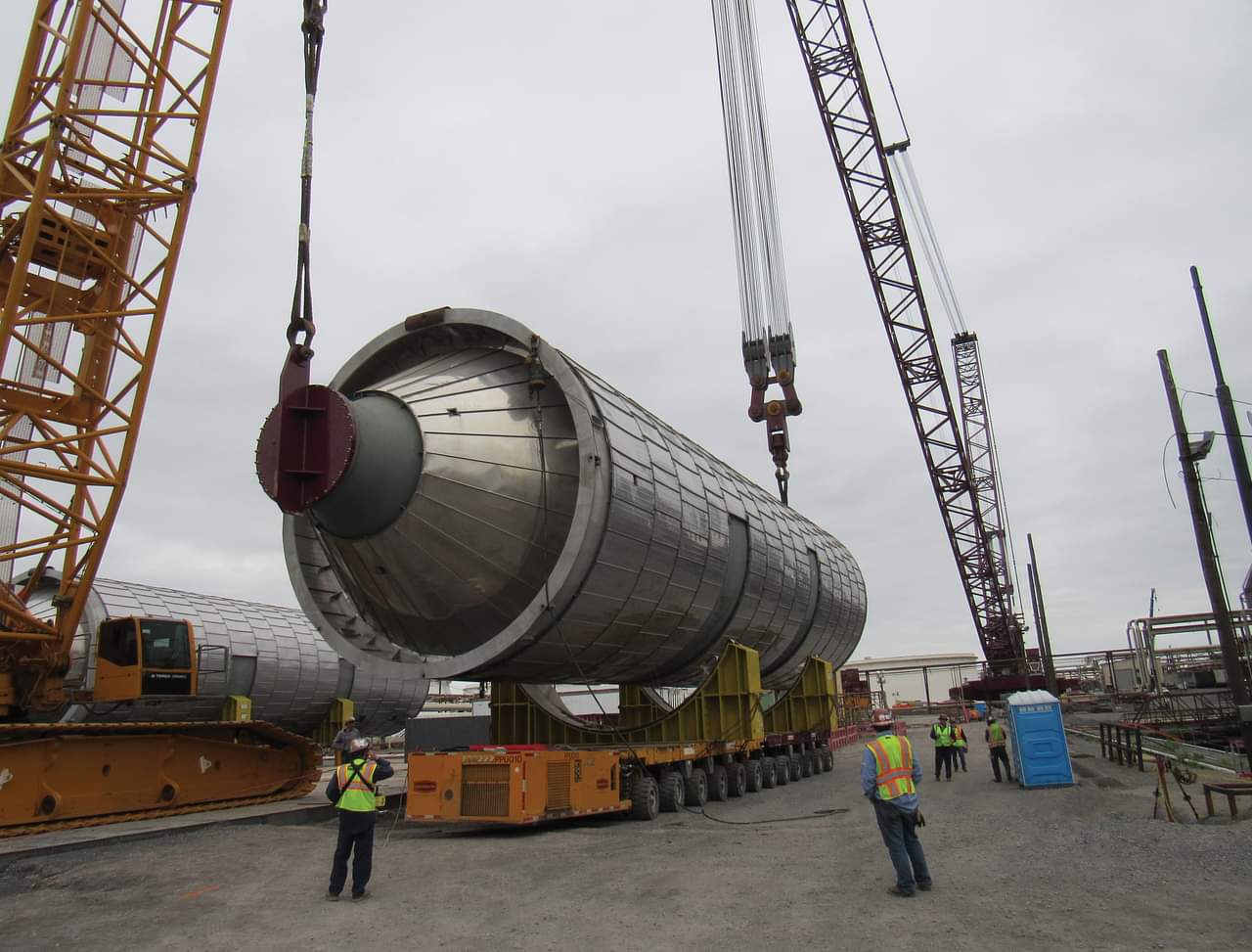 Crane Lifting Heavy Coke Drum from SPMT